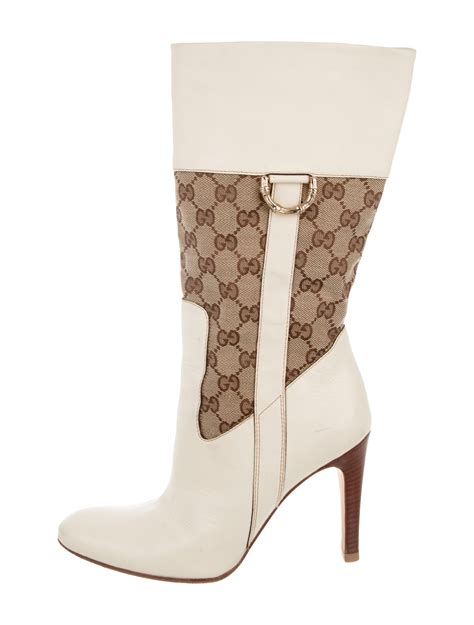 gucci boots.|Gucci high heel boots.